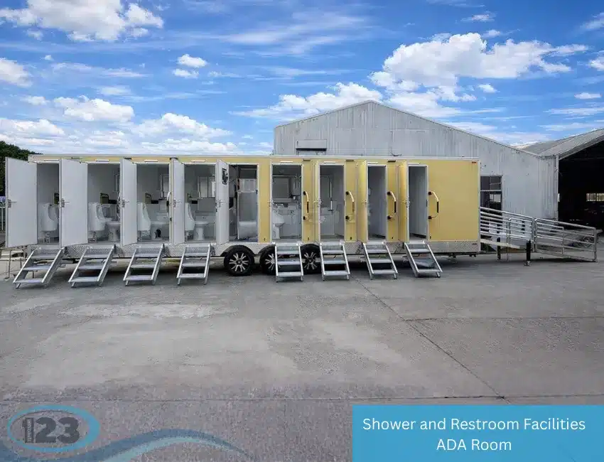 Large shower and restroom trailer with open private stalls and an ADA access ramp